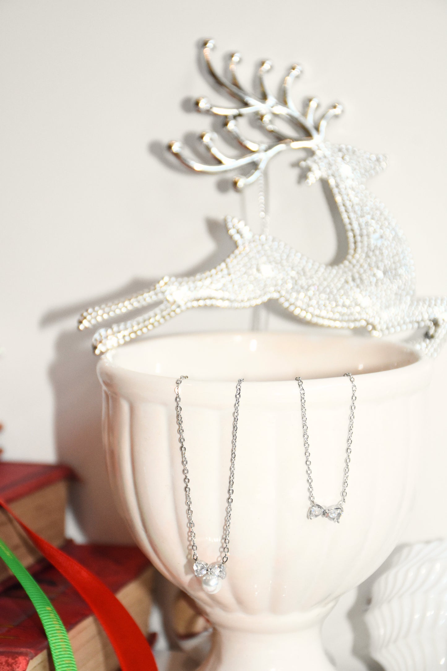 Winter Elegance Bow Necklace Collection