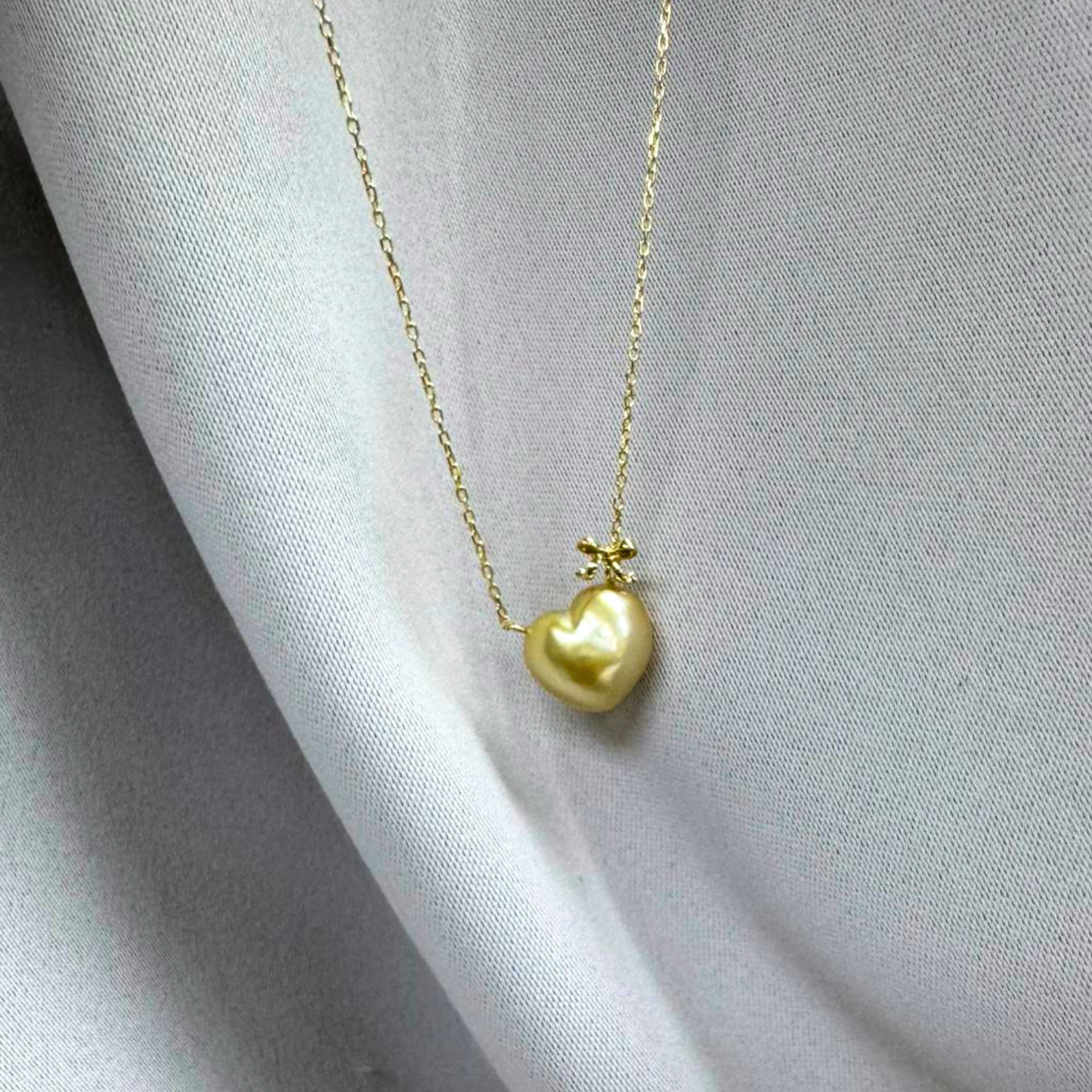 South Sea Heart-Shaped Golden Pearl Ribbon Bow Charm Necklace - 18K Solid Gold 1.5g (10mm)